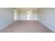 Neutral bedroom with doorways to other rooms, offering a seamless flow throughout the house at 383 Blue Lake Cir, Kissimmee, FL 34758