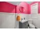 Charming bathroom with wainscoting, colorful walls, and modern fixtures at 1226 Se 9Th Ave, Ocala, FL 34471