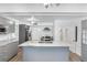 Modern kitchen with granite countertops, stainless steel appliances, and a functional center island at 1226 Se 9Th Ave, Ocala, FL 34471