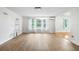Spacious living room featuring natural light, hardwood flooring, and modern decor at 1226 Se 9Th Ave, Ocala, FL 34471
