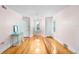 Bright living room with hardwood floors, neutral walls, and ample natural light through windows at 1226 Se 9Th Ave, Ocala, FL 34471