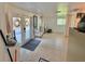 Basement area with access to the outside and tile flooring at 1423 Spruce N Rd, Lakeland, FL 33809