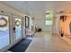 Basement has doors to the outside and a tile floor at 1423 Spruce N Rd, Lakeland, FL 33809