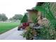 Inviting front porch featuring comfortable seating and lush landscaping for relaxing outdoors at 1423 Spruce N Rd, Lakeland, FL 33809