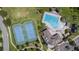 Aerial view highlighting the tennis courts, pool, and community recreation area at 2283 Geneva Dr, Lakeland, FL 33805