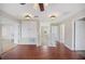 Bright hallway features hardwood floors, storage, and multiple entryways for a spacious feel at 2283 Geneva Dr, Lakeland, FL 33805