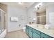 Well-lit bathroom with a shower, vanity with modern fixtures, and neutral color palette at 3175 Feltrim Pl # 405, Kissimmee, FL 34747
