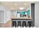 Efficient kitchen boasts a breakfast bar with seating and ample cabinet space at 3175 Feltrim Pl # 405, Kissimmee, FL 34747