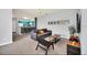 Spacious living room features modern decor, comfortable seating, and an open layout to the kitchen at 3175 Feltrim Pl # 405, Kissimmee, FL 34747
