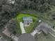 Aerial view of a single-Gathering home featuring a pool and well-maintained landscaping at 3952 Laurel Branch Dr, Lakeland, FL 33810
