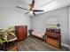 This charming bedroom is equipped with vinyl floors and a stylish ceiling fan at 3952 Laurel Branch Dr, Lakeland, FL 33810