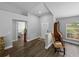 Inviting foyer with dark wood-look flooring, neutral walls, and an open, airy design at 3952 Laurel Branch Dr, Lakeland, FL 33810