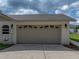 Close-up of the garage door highlighting its decorative window design at 3952 Laurel Branch Dr, Lakeland, FL 33810