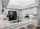 Modern kitchen boasts stainless steel appliances, granite countertops, and lots of light at 3952 Laurel Branch Dr, Lakeland, FL 33810