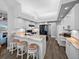 Modern kitchen features granite countertops, stainless steel appliances, and bar seating at 3952 Laurel Branch Dr, Lakeland, FL 33810