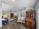 A spacious living room with lots of furniture, hardwood floors, and lots of natural light at 3952 Laurel Branch Dr, Lakeland, FL 33810
