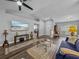 Bright living area with high ceilings, modern decor, and a seamless flow to other living spaces at 3952 Laurel Branch Dr, Lakeland, FL 33810