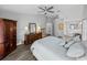 Bright main bedroom with vaulted ceiling and en suite bathroom featuring granite countertops and a shower at 3952 Laurel Branch Dr, Lakeland, FL 33810