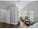 Bright main bedroom with en suite bathroom featuring granite countertops, dual sinks, and walk-in shower at 3952 Laurel Branch Dr, Lakeland, FL 33810