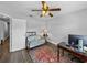 Office space with a comfortable couch, ceiling fan and desk with computer at 3952 Laurel Branch Dr, Lakeland, FL 33810