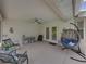 View of an outdoor lanai with seating, stylish decor, and ceiling fan at 3952 Laurel Branch Dr, Lakeland, FL 33810