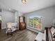 Charming room with a window, complemented by elegant furniture and wood-style flooring at 3952 Laurel Branch Dr, Lakeland, FL 33810