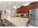 A kitchen with stainless steel appliances and a large island at 224 Granada Ln, Davenport, FL 33837