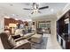 Bright living area extending to outdoor patio with a comfortable seating arrangement at 224 Granada Ln, Davenport, FL 33837