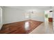 Spacious living room with wood floors and natural light at 442 Graystone Blvd, Davenport, FL 33837