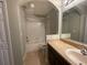Well-maintained bathroom featuring shower-tub combo and stylish vanity with ample counter space at 10303 Park Commons Dr, Orlando, FL 32832