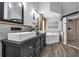 Modern main bathroom with double sinks, soaking tub, walk-in shower, and beautiful finishes at 10421 Mesa Ln, Clermont, FL 34711