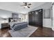 Serene main bedroom with elegant decor, ceiling fan, and an abundance of natural light at 10421 Mesa Ln, Clermont, FL 34711