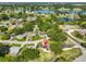 Aerial view of home, community and several ponds. Great established neighborhood with mature trees and lush greenery at 1110 Waterview E Blvd, Lakeland, FL 33801