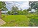 A spacious, green backyard with plenty of space for recreation at 1110 Waterview E Blvd, Lakeland, FL 33801