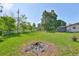 Expansive backyard with well-maintained lawn and distant view of the house at 1110 Waterview E Blvd, Lakeland, FL 33801