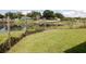 View of the backyard and a partial view of the lake at 1206 Skyview Cv, Lakeland, FL 33801