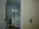 Bathroom featuring a shower, vanity, and toilet at 1206 Skyview Cv, Lakeland, FL 33801
