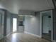 Dining area with wood flooring, light gray walls, pantry area, and convenient access to adjacent rooms at 1206 Skyview Cv, Lakeland, FL 33801