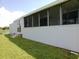 Exterior view of home showcasing the screened-in lanai at 1206 Skyview Cv, Lakeland, FL 33801