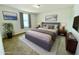 Inviting bedroom featuring a large bed, soft rug, and stylish decor for a comfortable retreat at 222 Carpenters Way # 71, Lakeland, FL 33805