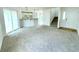Open living space with modern kitchen, dining area, and comfortable living room with sliding door at 222 Carpenters Way # 71, Lakeland, FL 33805