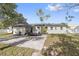 Spacious backyard featuring a concrete patio perfect for outdoor entertaining and relaxing at 2800 E Anderson St, Orlando, FL 32803