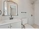 Bright bathroom featuring a new vanity, toilet and tiled shower at 2800 E Anderson St, Orlando, FL 32803