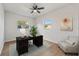 Bright office featuring two windows, wood flooring, and modern furnishings at 2800 E Anderson St, Orlando, FL 32803