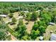 Aerial perspective of the property showing the expansive greenery, surrounding landscape and location at 28712 Azalea Ave, Paisley, FL 32767