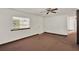 Bedroom with ceiling fan, window and door at 28712 Azalea Ave, Paisley, FL 32767