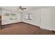Bedroom with ceiling fan and windows at 28712 Azalea Ave, Paisley, FL 32767