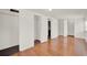 Spacious bedroom showcasing laminate flooring and a convenient walk-in closet at 28712 Azalea Ave, Paisley, FL 32767