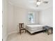 Well-lit bedroom with a ceiling fan and neutral color scheme at 7991 Lake James Blvd, Lakeland, FL 33810