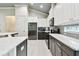 Well-equipped kitchen with an island, stainless steel fridge, and sleek countertops at 7991 Lake James Blvd, Lakeland, FL 33810